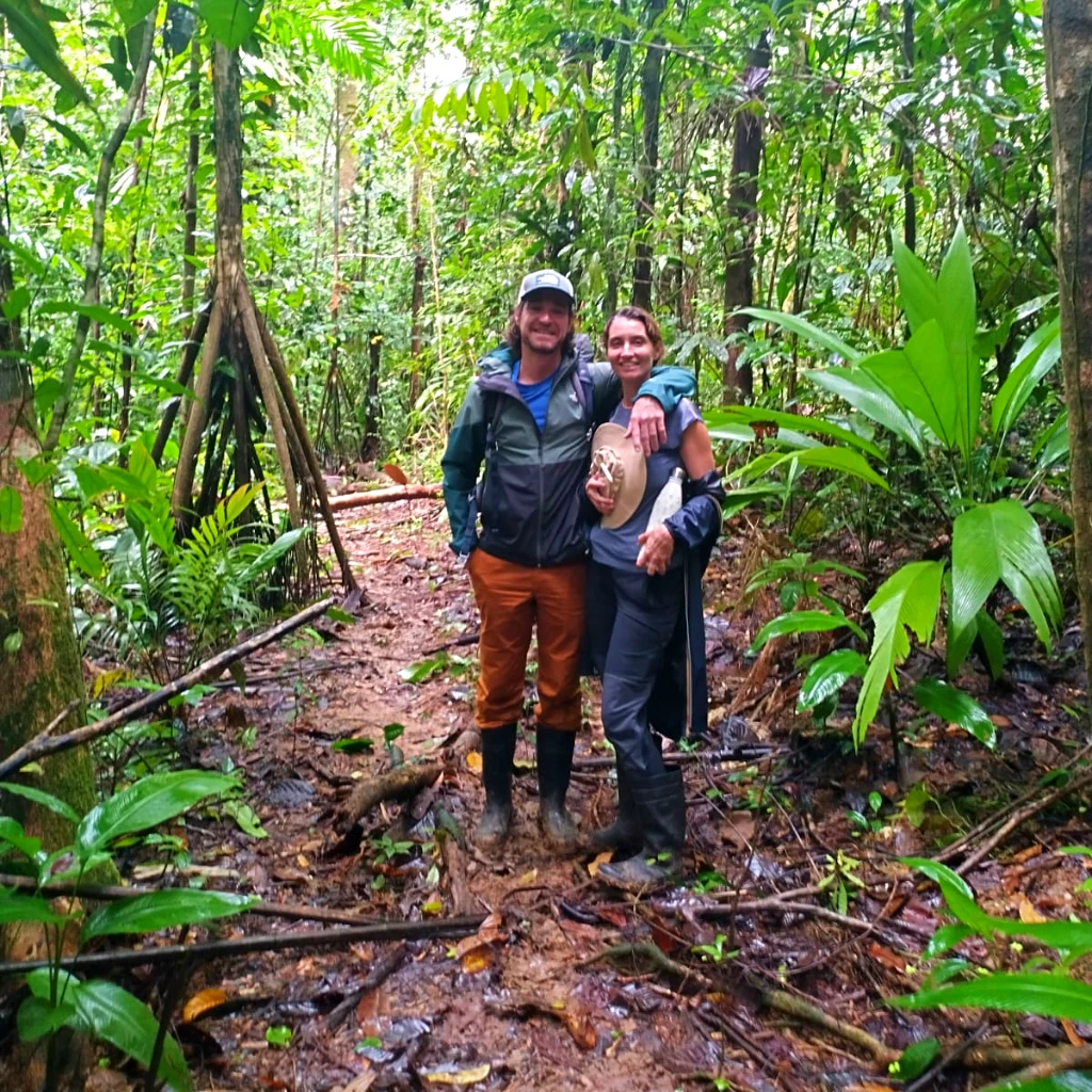 Visitor walking through the primary rainforest at Corcovado Next Door Reserve near Drake Bay, Costa Rica, guided by Osa Outdoors Adventures.